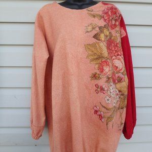 . Hand felted tunic with a flower detail